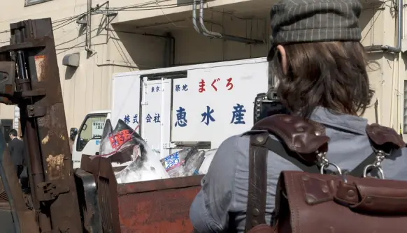Rob Stewart filming tuna markets in Tokyo. Photo © Paul Wildman www.builtbywildman.com From the documentary film Revolution.