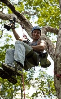 Climbing trees in Brazil. Photo © Brennan Grange. www.bgrangephotography.ca From the documentary film Revolution.